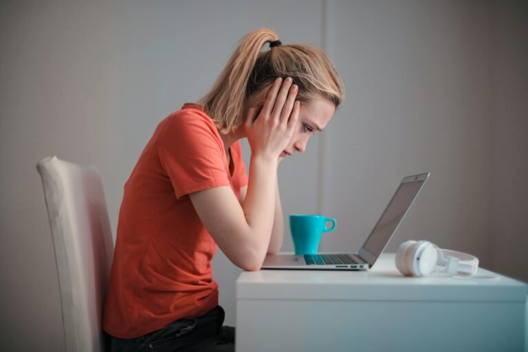 woman sad over not accomplishing a task at work