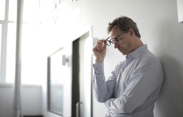 man thinking about job difficulties